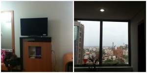 TV vista da cama e a vista do hotel